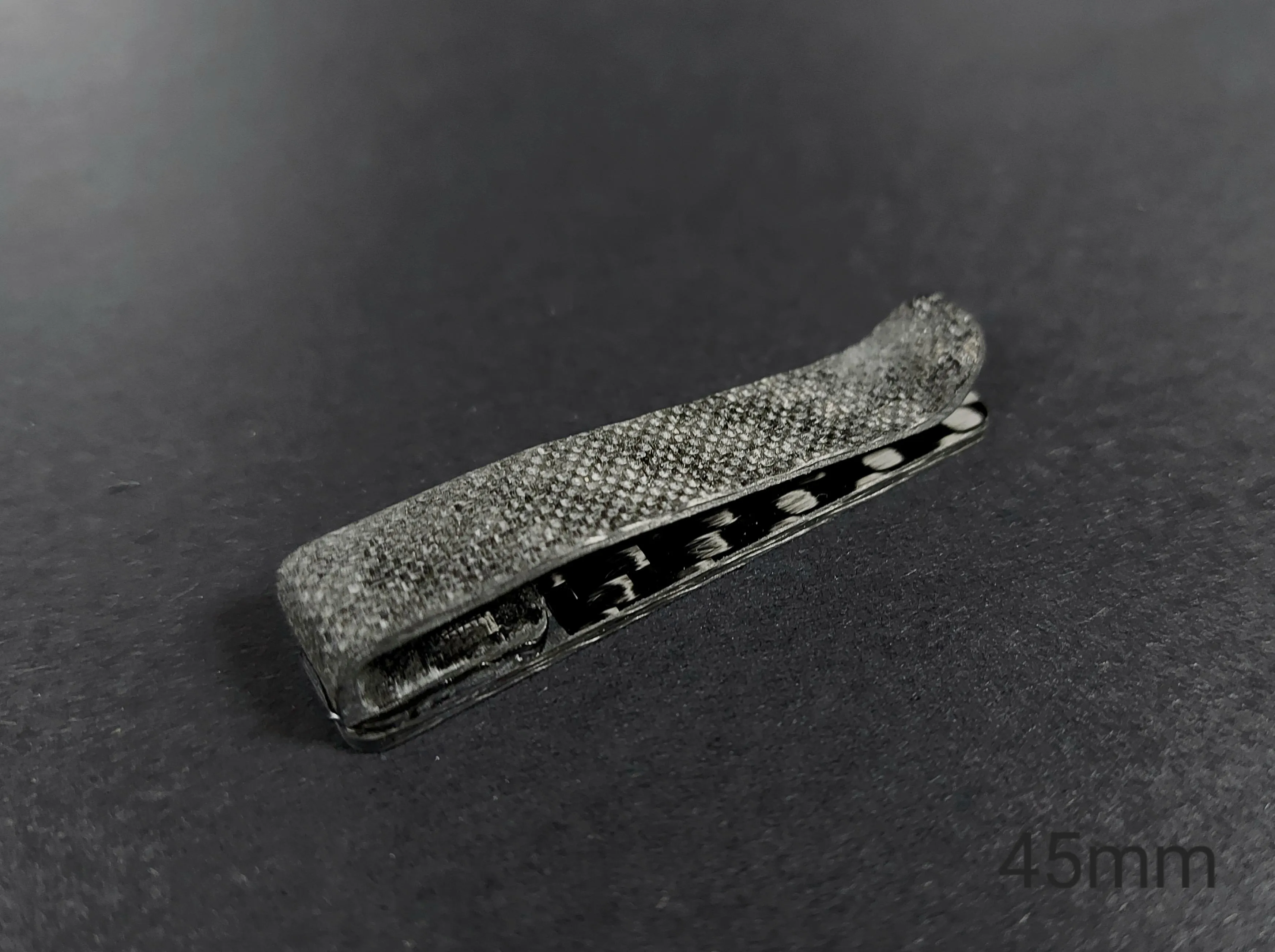 Carbon fiber tie clip