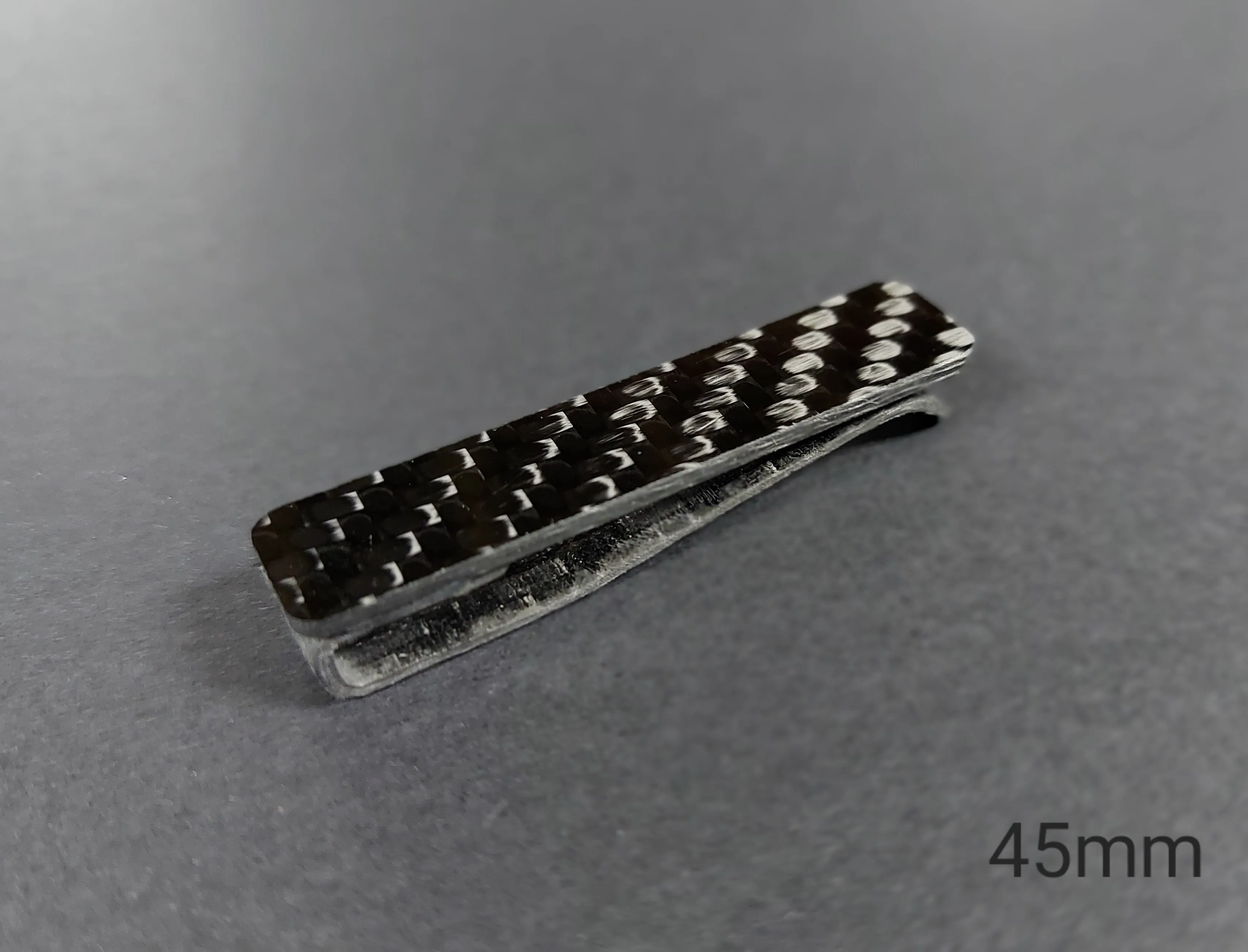 Carbon fiber tie clip