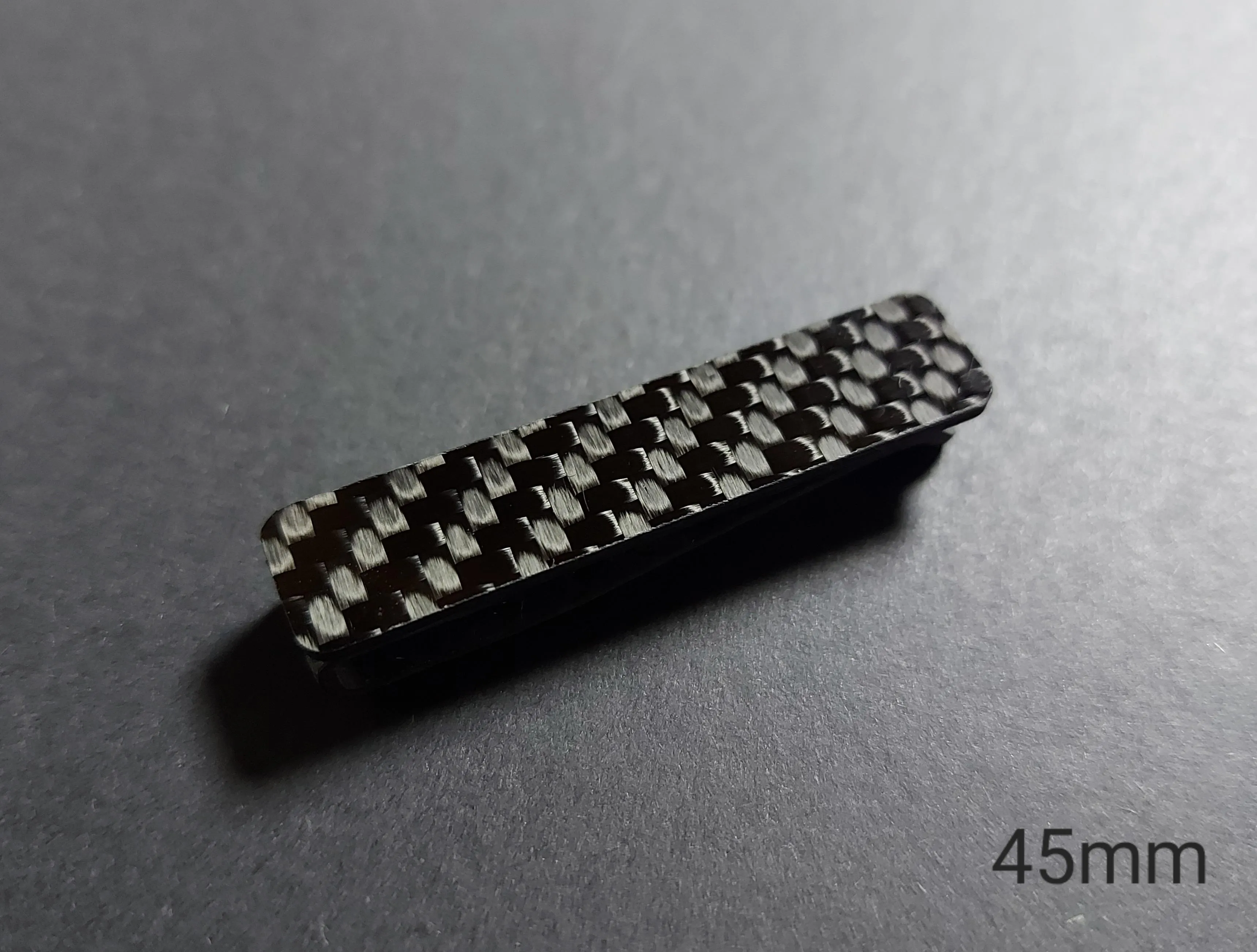 Carbon fiber tie clip