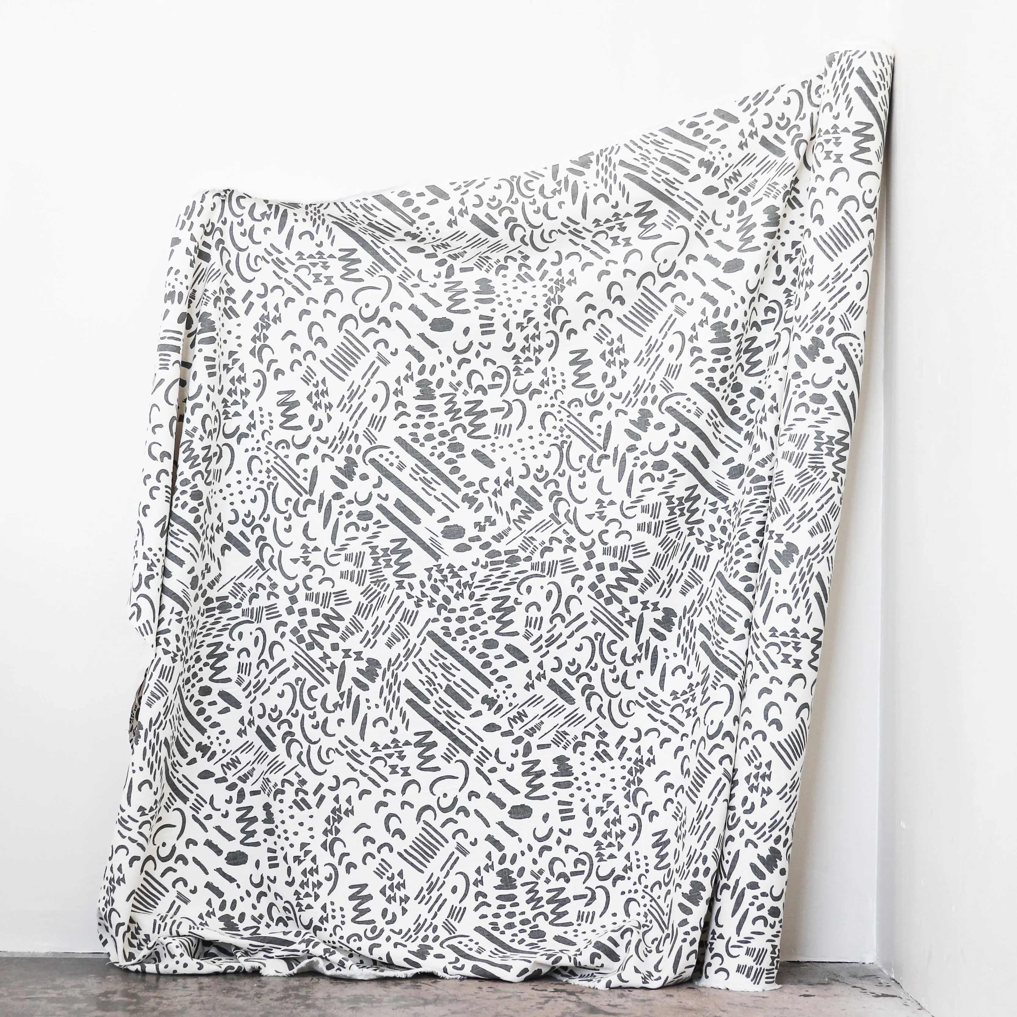 DASHES & MOONS in CHARCOAL - Fabric by the yard