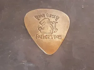 My first Fathers Day Brass Guitar Pick