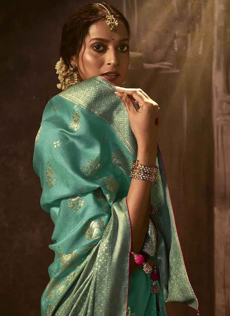 Teal And Pink Weaved Pure Dola Silk Saree