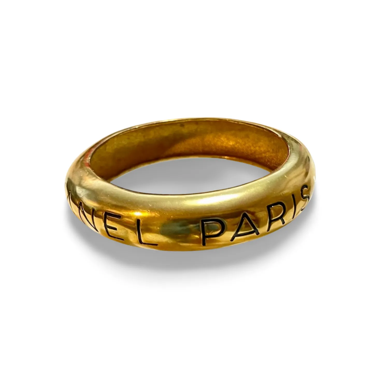 Vintage Chanel golden bangle with embossed black logo.  Must have gorgeous jewelry. 060810r1