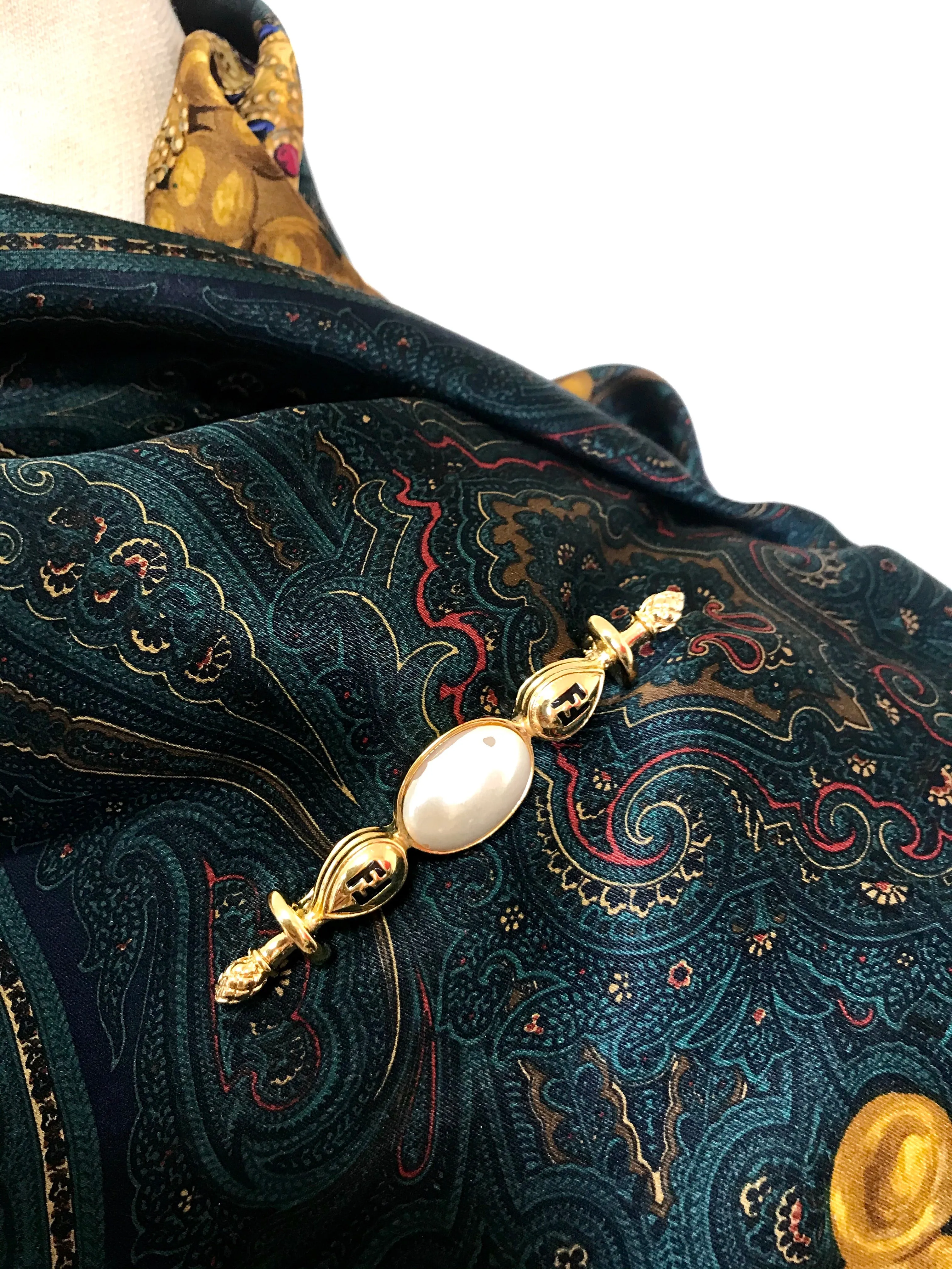 Vintage FENDI gold tone hat pin with white oval faux pearl and FF mark. Can be used as a brooch pin, jacket brooch pin too. 060926re5