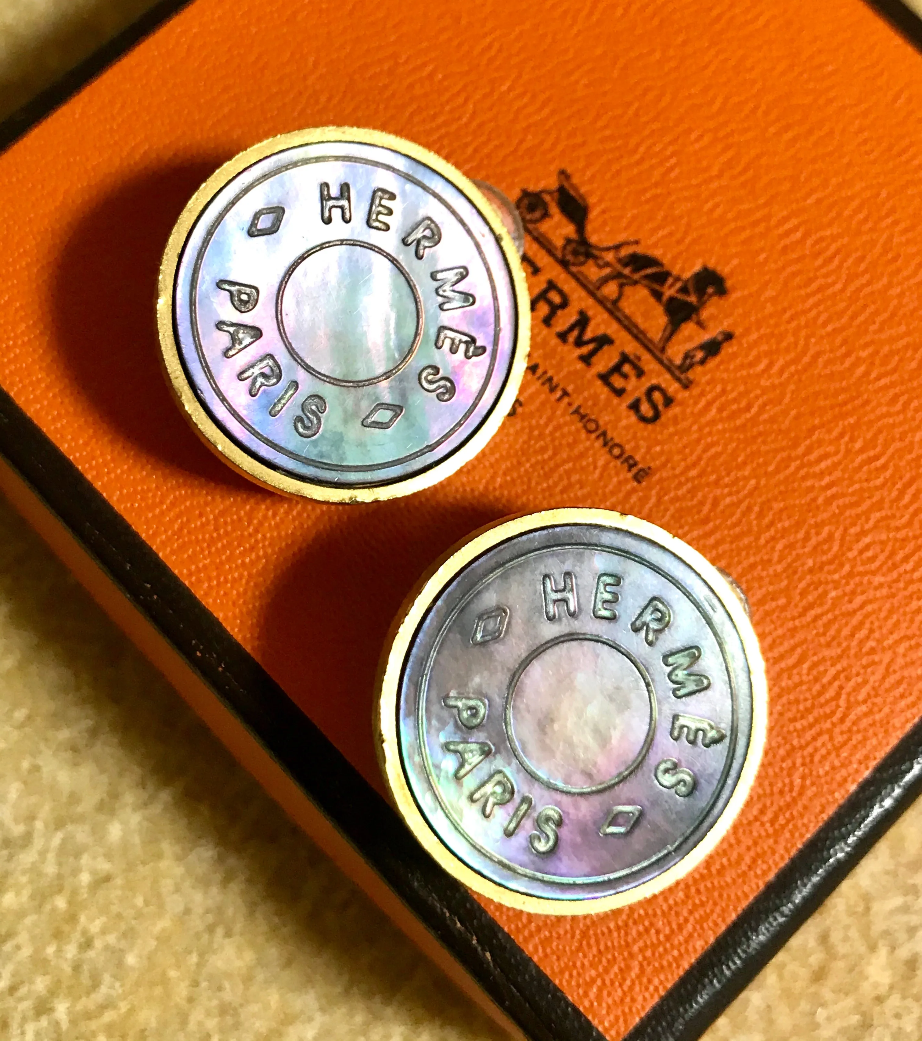 Vintage HERMES golden logo embossed genuine shell earrings. Classic jewelry piece. Bijouterie Fantaisie. Shines like aurora.