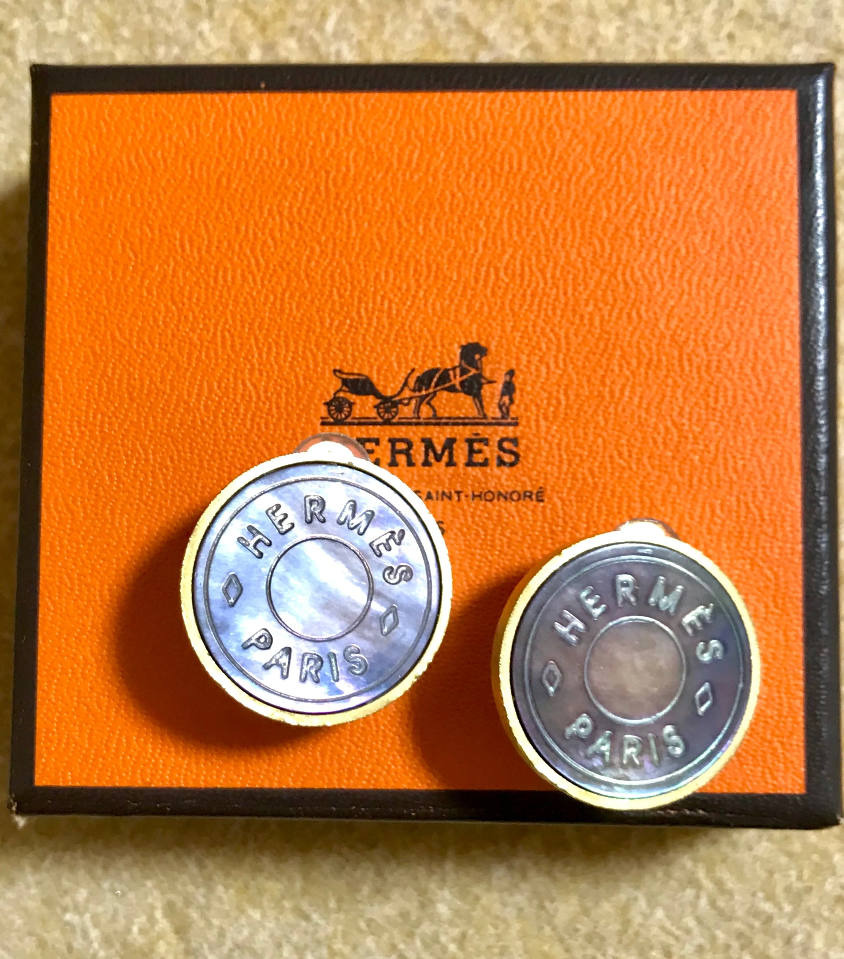 Vintage HERMES golden logo embossed genuine shell earrings. Classic jewelry piece. Bijouterie Fantaisie. Shines like aurora.