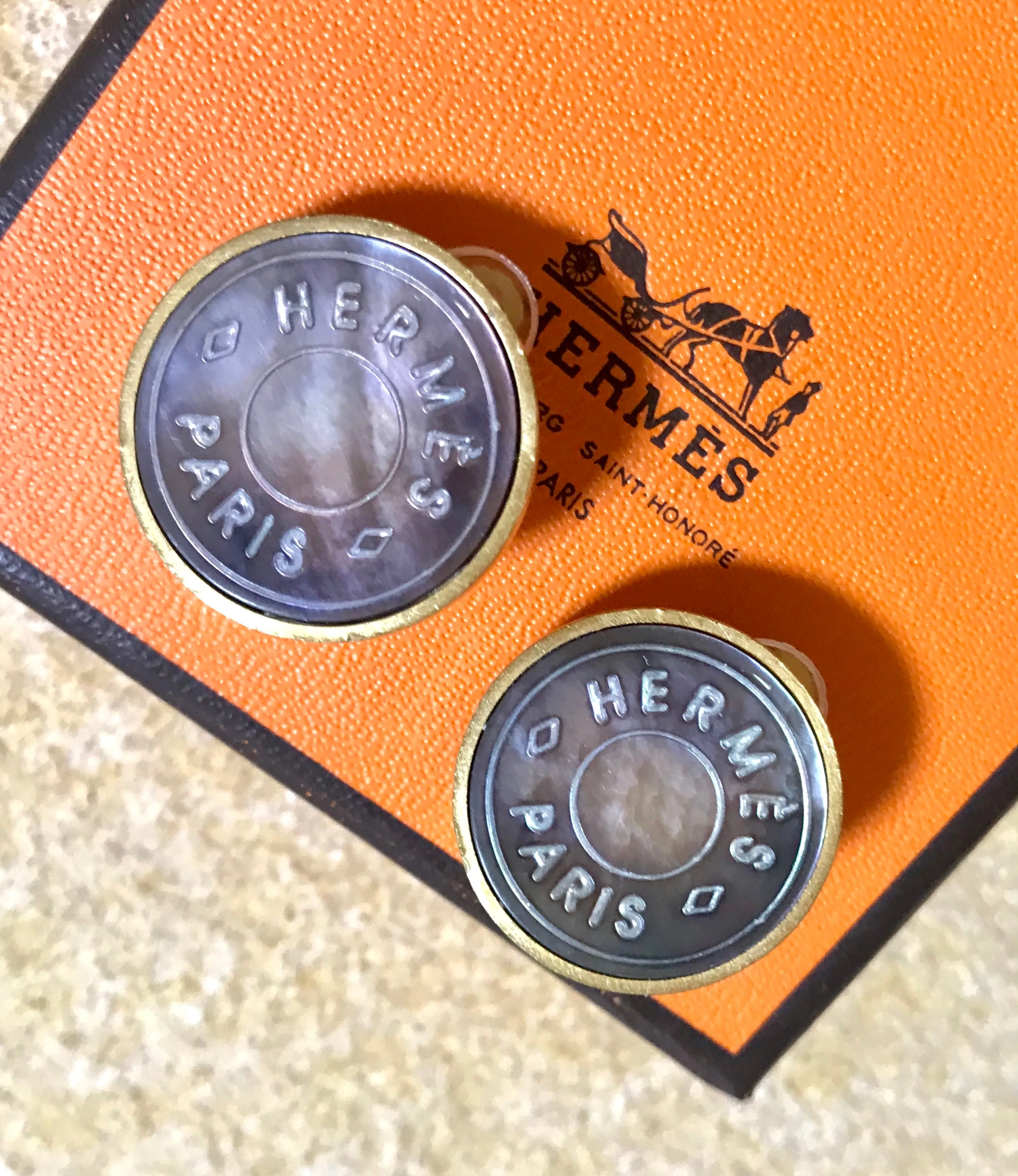 Vintage HERMES golden logo embossed genuine shell earrings. Classic jewelry piece. Bijouterie Fantaisie. Shines like aurora.