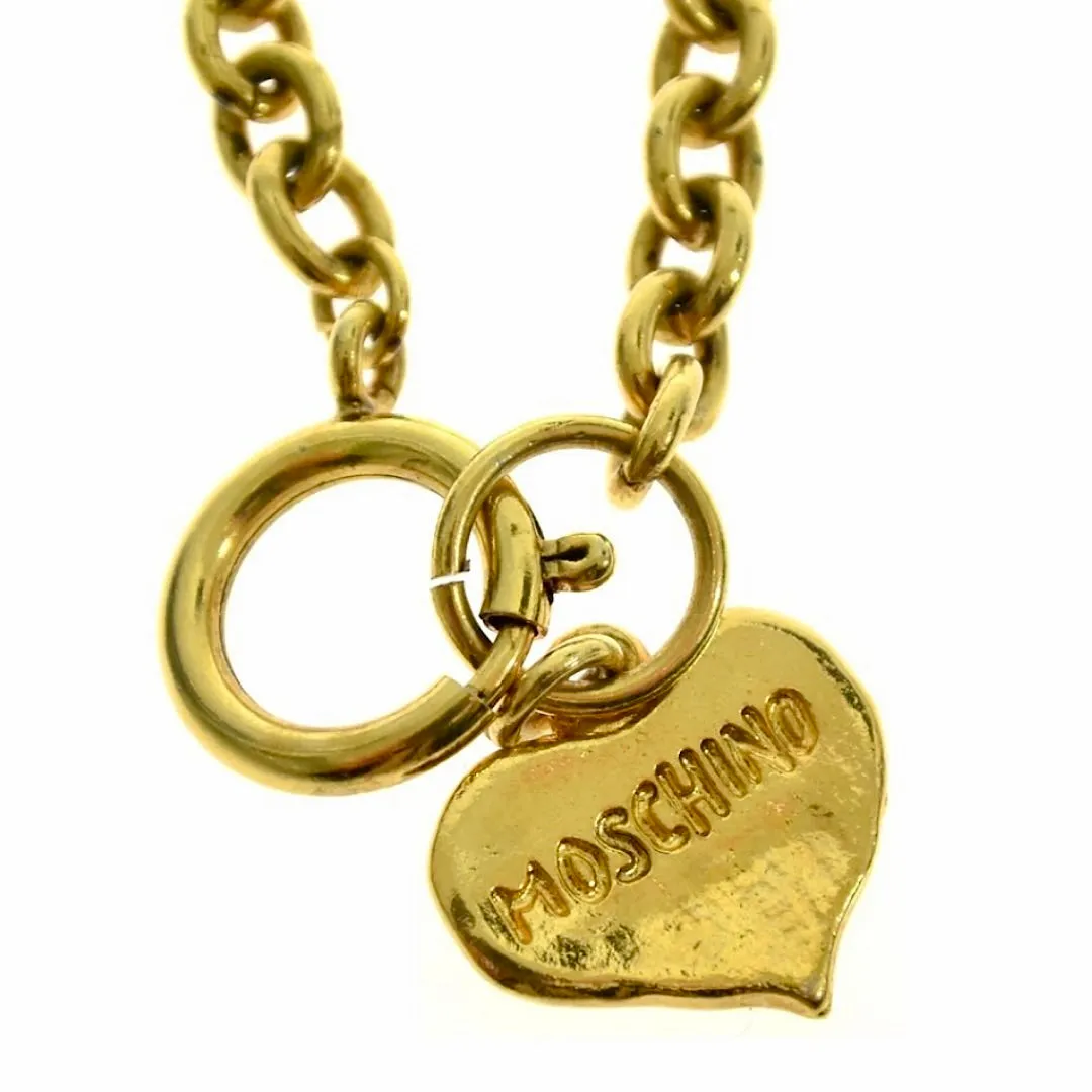 Vintage Moschino golden chain necklace with Give Me Love pendant top. Must have classic jewelry piece. 060914y1