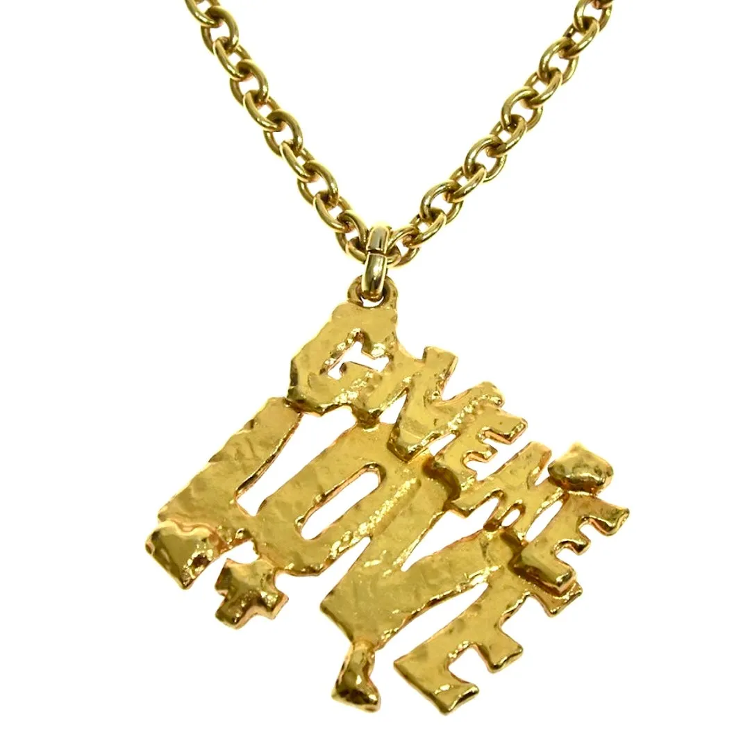 Vintage Moschino golden chain necklace with Give Me Love pendant top. Must have classic jewelry piece. 060914y1