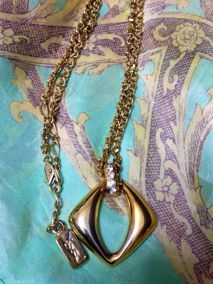 Vintage Yves Saint Laurent, YSL golden chain necklace with outlined square, diamond shape pendant top with crystal stones. Perfect gift