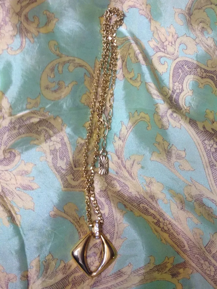 Vintage Yves Saint Laurent, YSL golden chain necklace with outlined square, diamond shape pendant top with crystal stones. Perfect gift