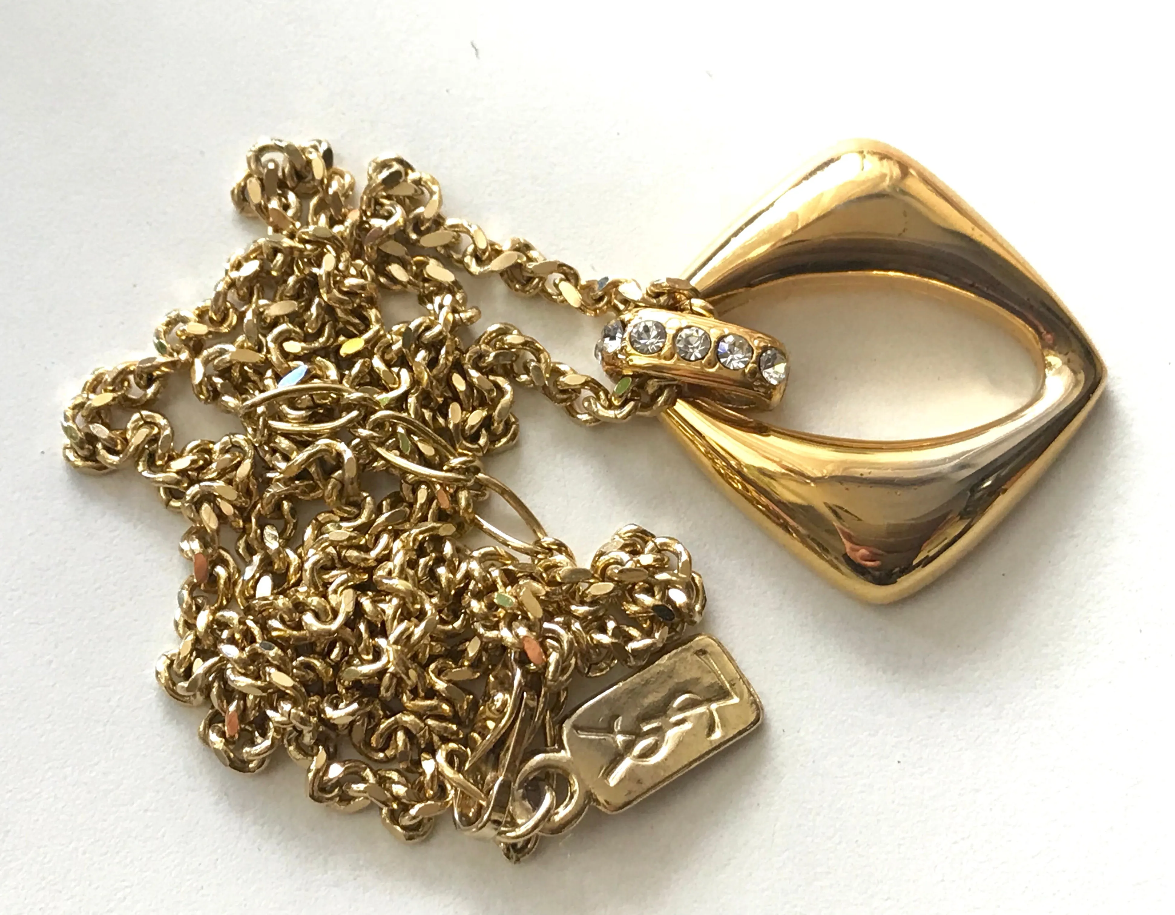 Vintage Yves Saint Laurent, YSL golden chain necklace with outlined square, diamond shape pendant top with crystal stones. Perfect gift